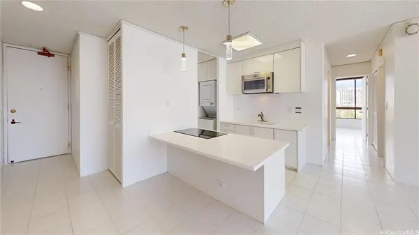 a bathroom with a sink a mirror and a shower