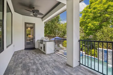 a view of a porch with wooden floor and outdoor space