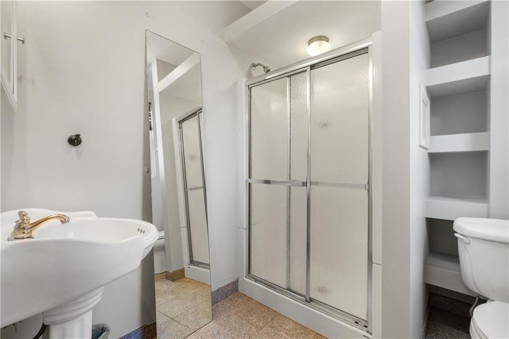 3578 Brighton Road Pittsburgh, PA 15212 - Photo 14 of 35 The first floor full bath offers a large shower.