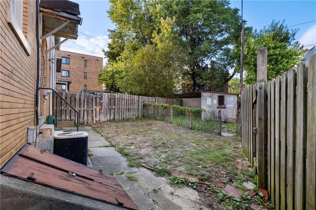 3578 Brighton Road Pittsburgh, PA 15212 - Photo 30 of 35 The off-street parking is located in the fenced area.