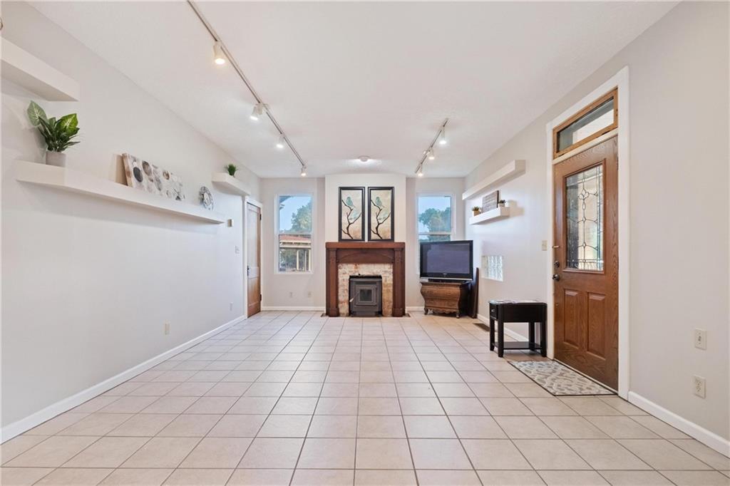 3578 Brighton Road Pittsburgh, PA 15212 - Photo 3 of 35 The living room is generously sized with beautiful fireplace.