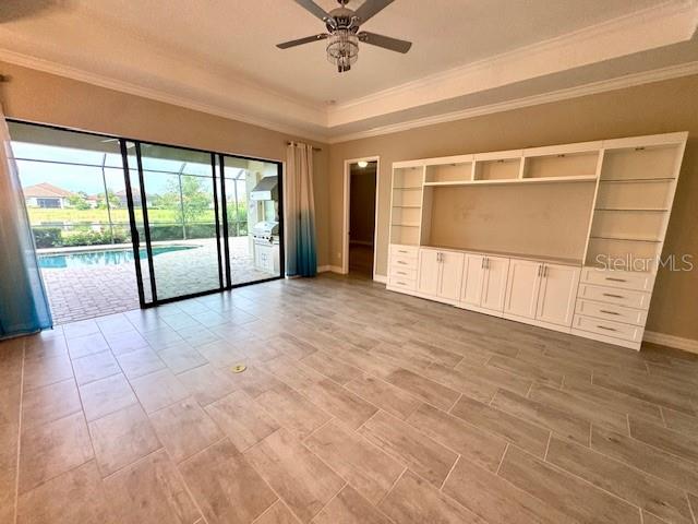 7113 Whittlebury Trail Lakewood Ranch, FL 34202 - Photo 10 of 15 a view of an empty room with a window