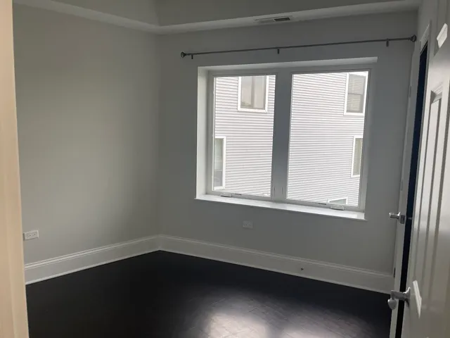 a view of small space with racks on the wall