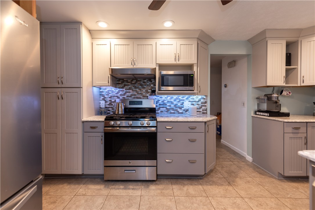 11 Fallbrook Circle Penfield, NY 14625 - Photo 13 of 49 GAS OVENRANGE ~ QUARTZ COUNTERTOPS ~ SOFT CLOSE DR