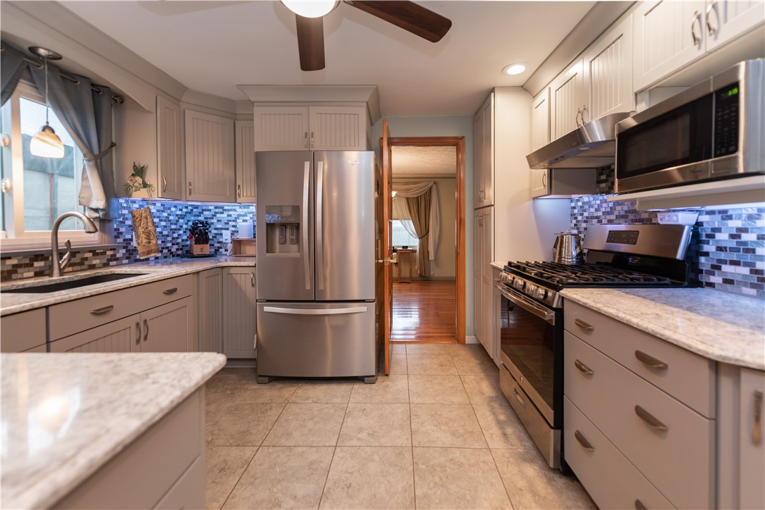 11 Fallbrook Circle Penfield, NY 14625 - Photo 14 of 49 FORMAL DINING AREA ON OTHER SIDE OF THE KITCHEN