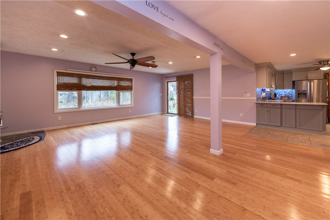 11 Fallbrook Circle Penfield, NY 14625 - Photo 6 of 49 BAMBOO FLOORING. SLIDER OUT TO THE DECK. GREAT ENT