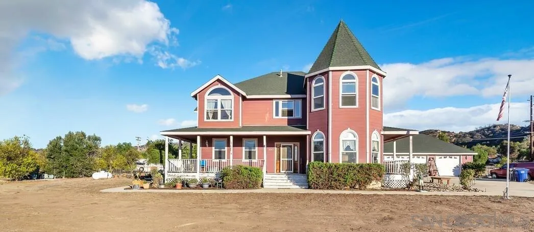 1880 Keyes Road Ramona, CA 92065 - Photo 1 of 49 a front view of a house with a yard