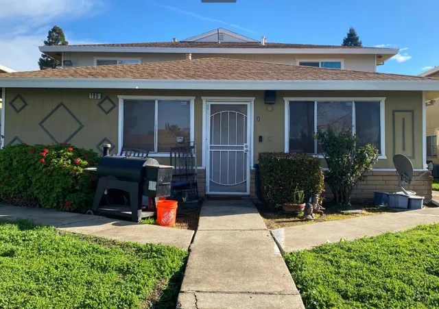 a front view of a house with a porch