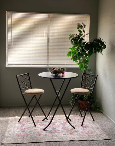 a table and chairs in a room