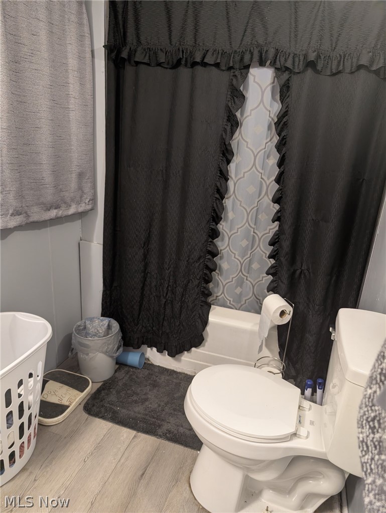 3 South 2nd Street Dennison, OH 44621 - Photo 13 of 16 Full bathroom with toilet and wood finished floors