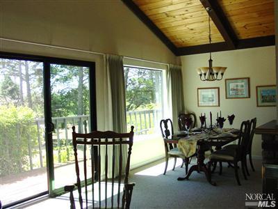 1510 Schaeffer Road Sebastopol, CA 95472 - Photo 5 of 12 a view of a dining room with furniture window and outside view