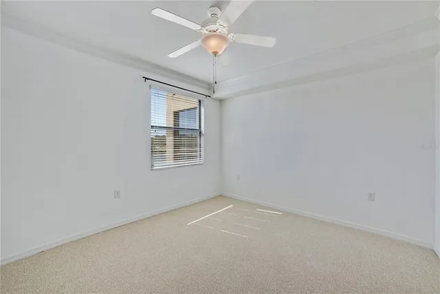 a bathroom with a granite countertop sink a mirror and a shower