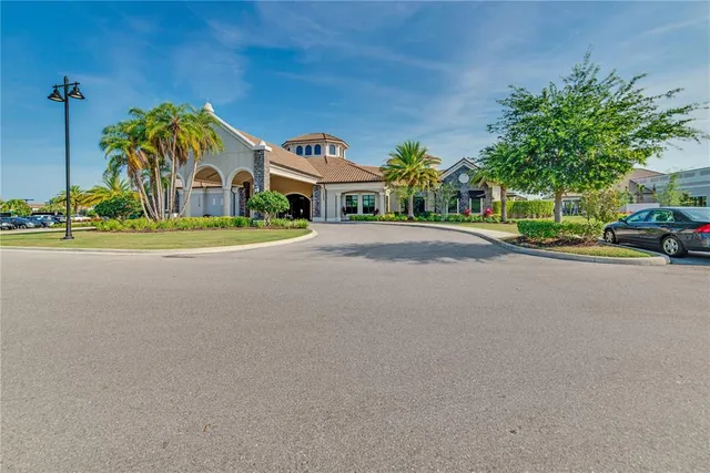 a view of a swimming pool with a patio