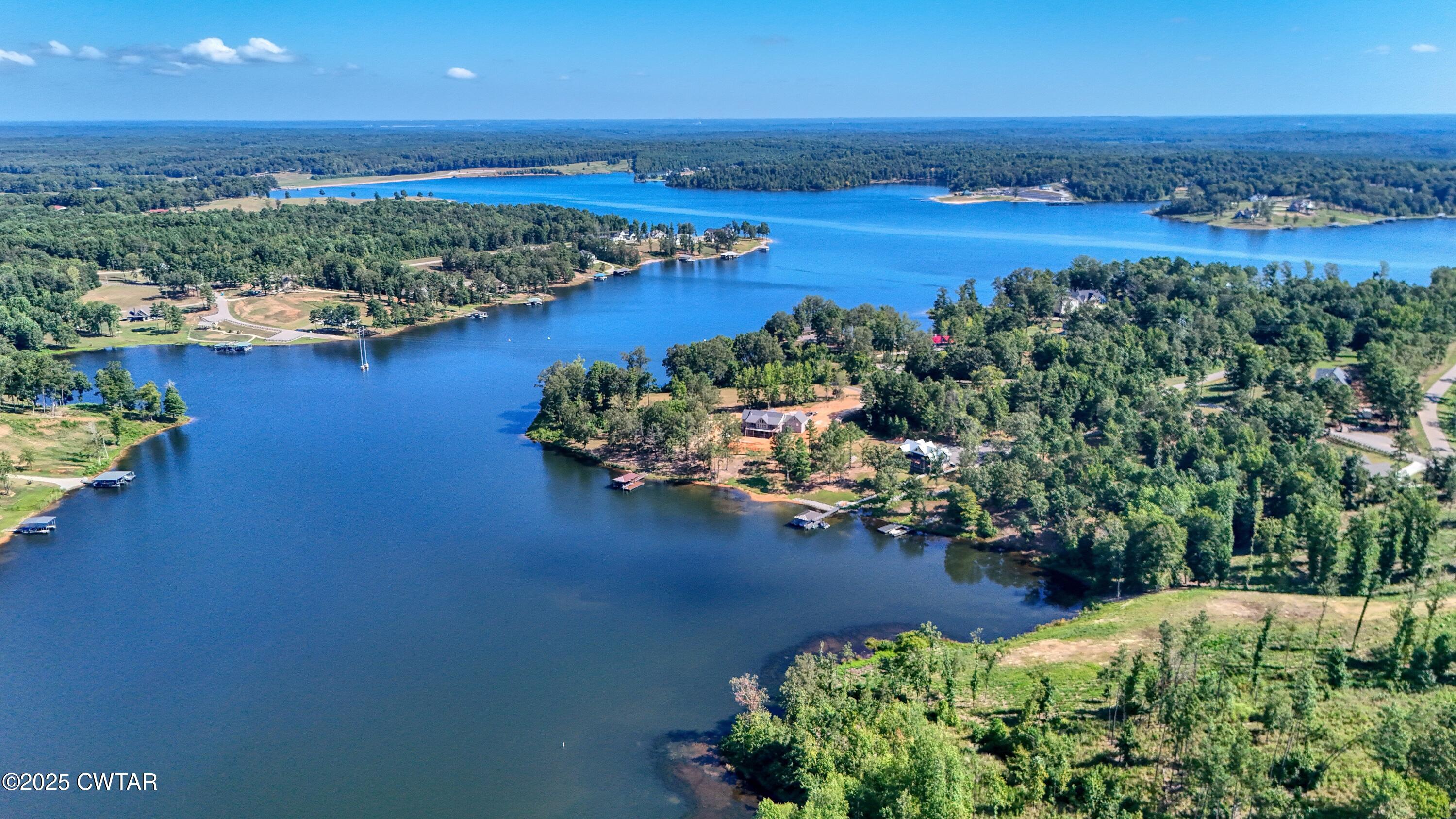 0 Kyle Road Huntingdon, TN 38344 - Photo 3 of 10 an aerial view of a houses with a lake view