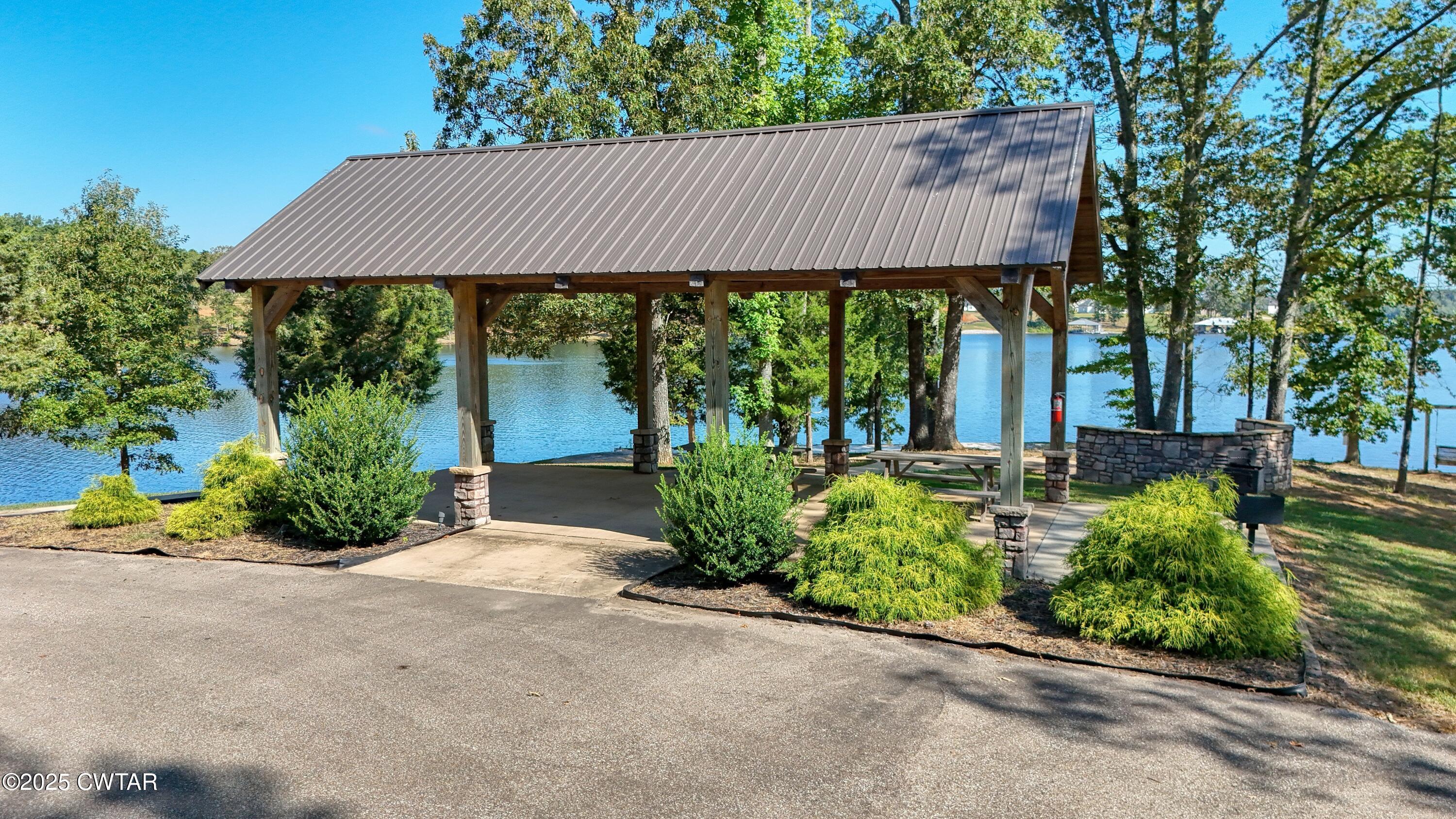 0 Kyle Road Huntingdon, TN 38344 - Photo 10 of 10 a view of a garden with plants and a small yard