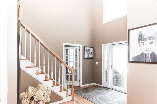 a view of entryway with wooden floor
