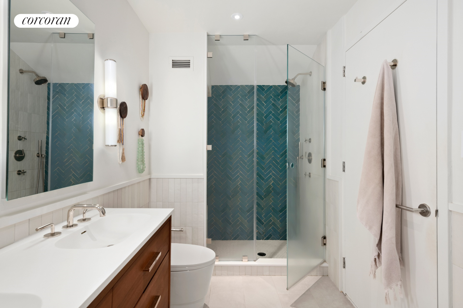 130 Fulton Street, Unit 12A Manhattan, NY 10038 - Photo 13 of 17 a bathroom with a sink a toilet and shower