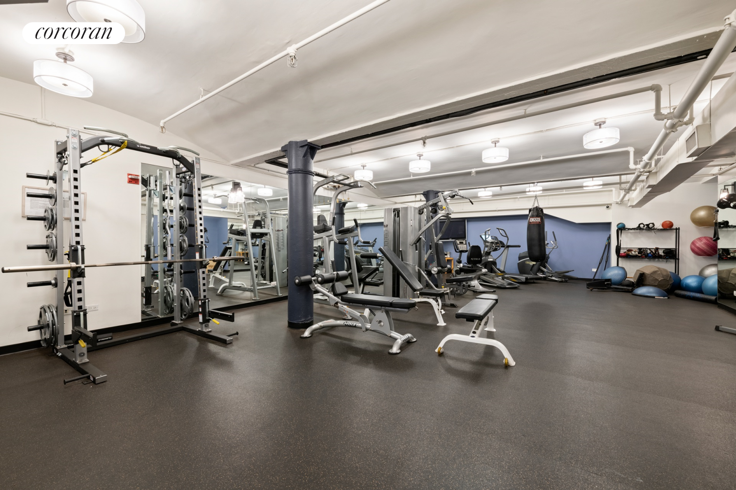 130 Fulton Street, Unit 12A Manhattan, NY 10038 - Photo 16 of 17 a view of a room with gym equipment