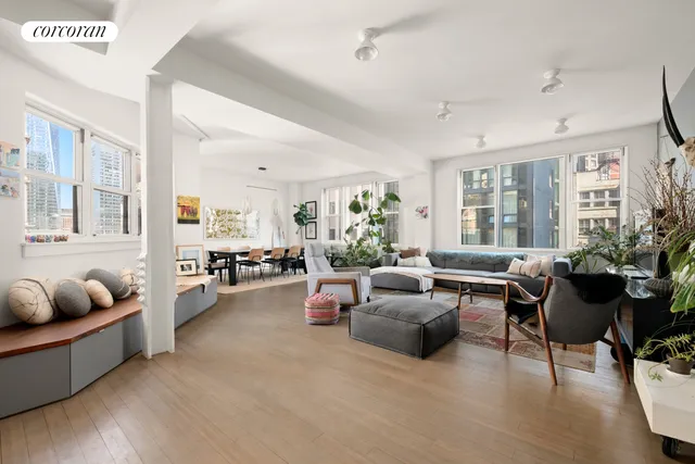 a black and white photo of a living room