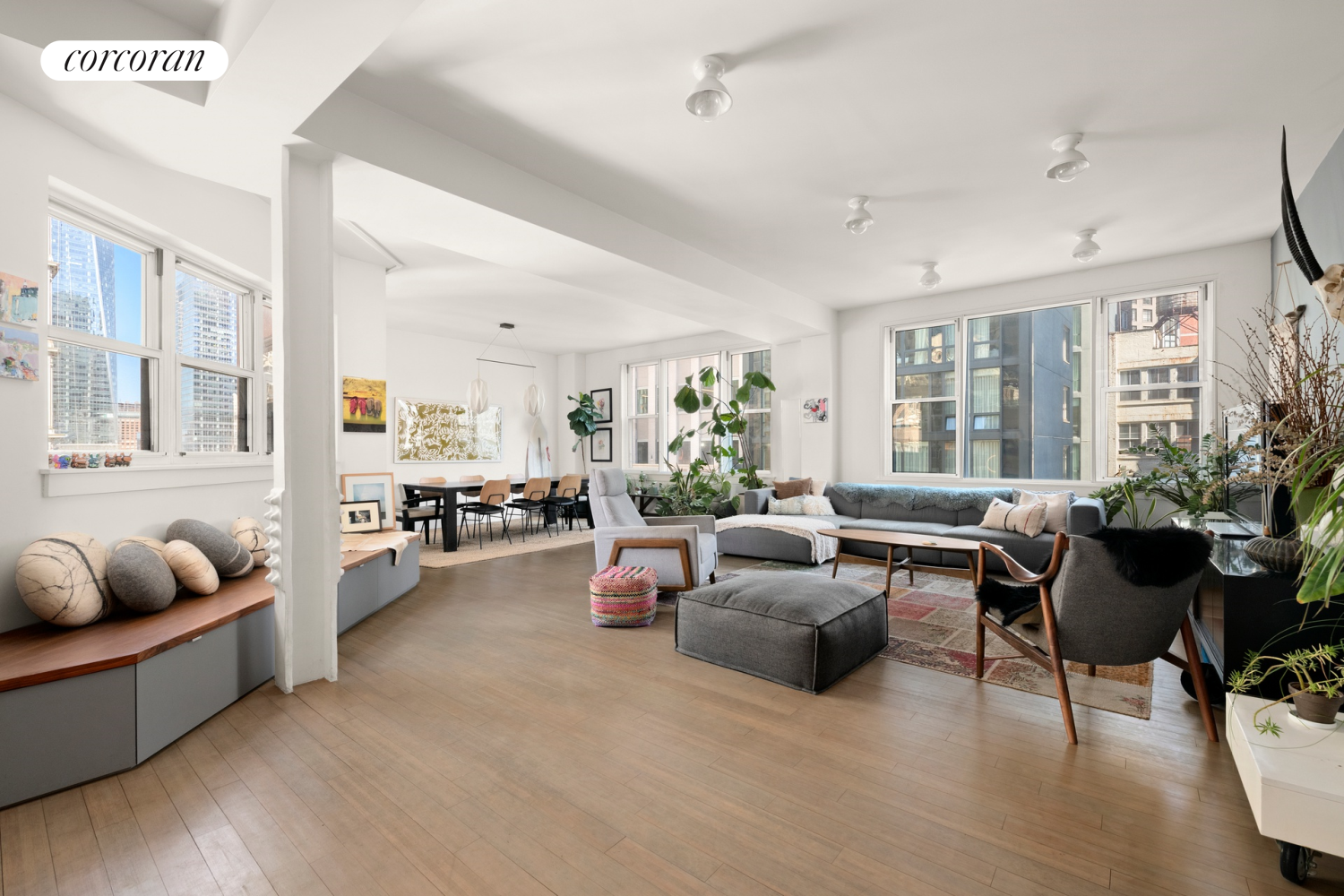 a living room with furniture and windows