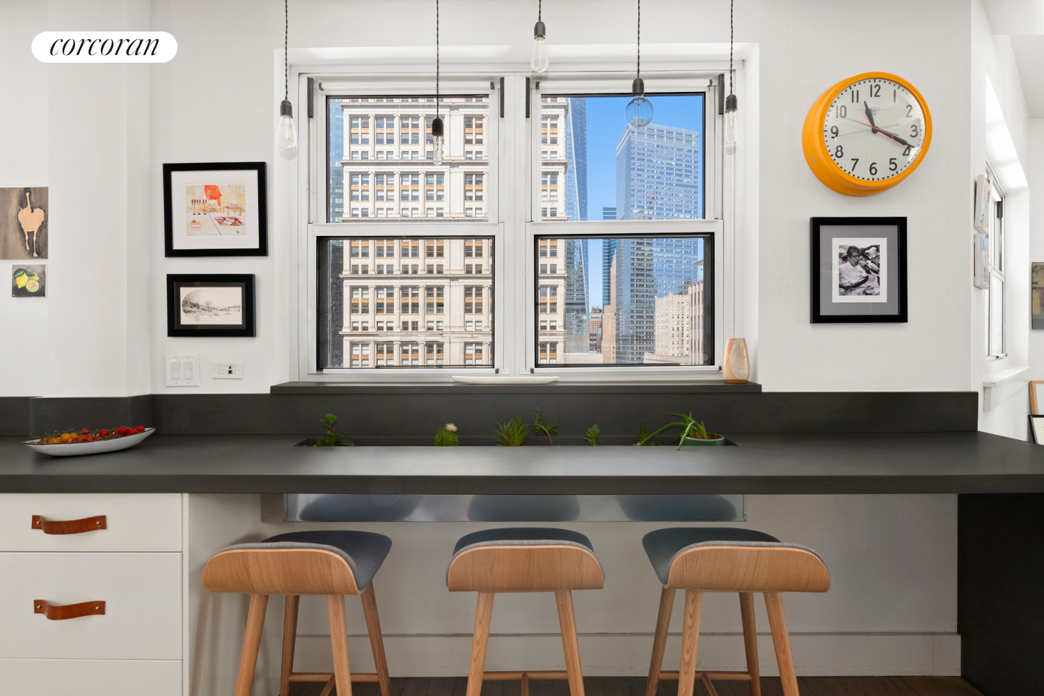 130 Fulton Street, Unit 12A Manhattan, NY 10038 - Photo 3 of 17 a kitchen with a table chairs and a stove in it
