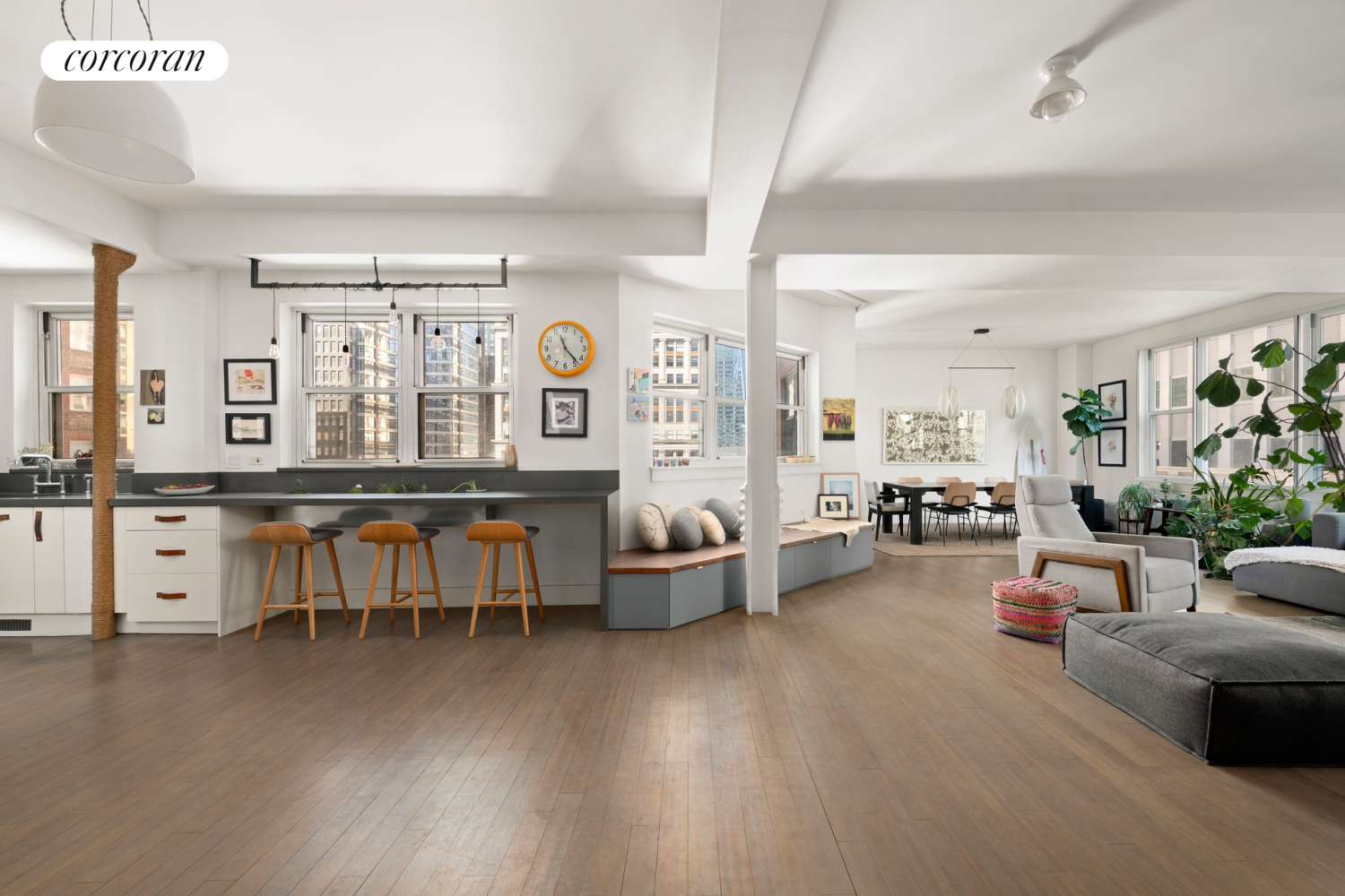 130 Fulton Street, Unit 12A Manhattan, NY 10038 - Photo 4 of 17 a living room with furniture and wooden floor