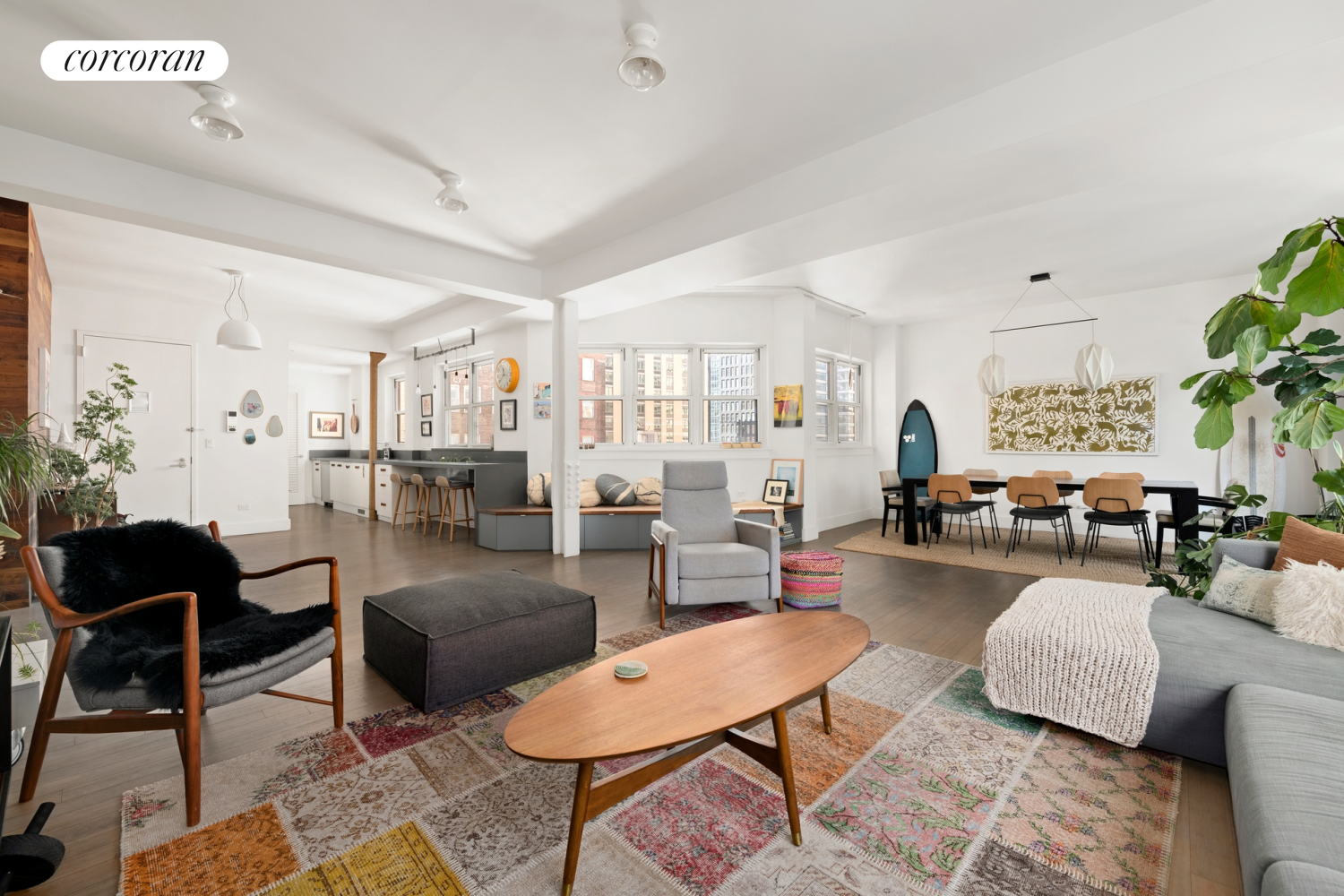 130 Fulton Street, Unit 12A Manhattan, NY 10038 - Photo 6 of 17 a living room with furniture and a rug