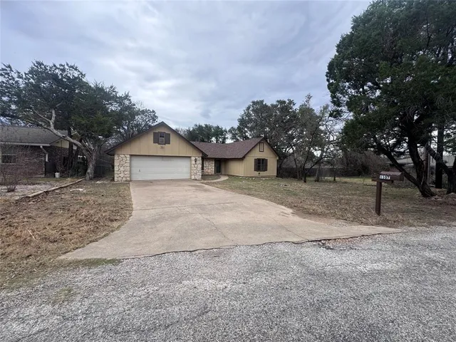 a view of backyard of house
