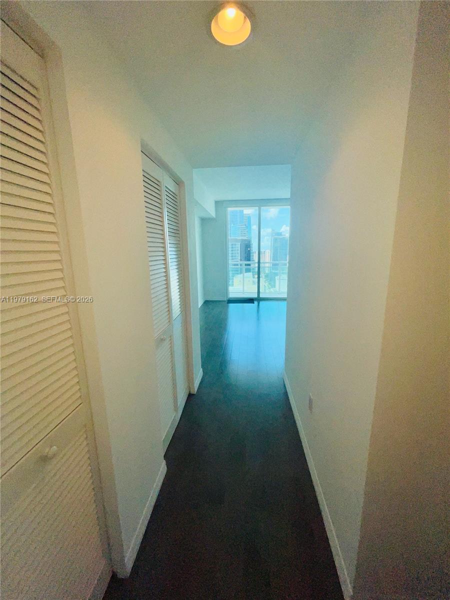 951 Brickell Avenue, Unit 3211 Miami, FL 33131 - Photo 17 of 35 a view of a hallway