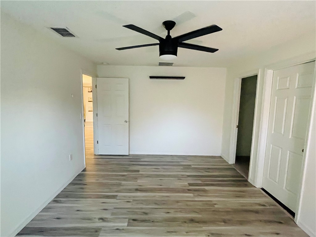 1281 Barber Street Sebastian, FL 32958 - Photo 15 of 26 a view of empty room with wooden floor