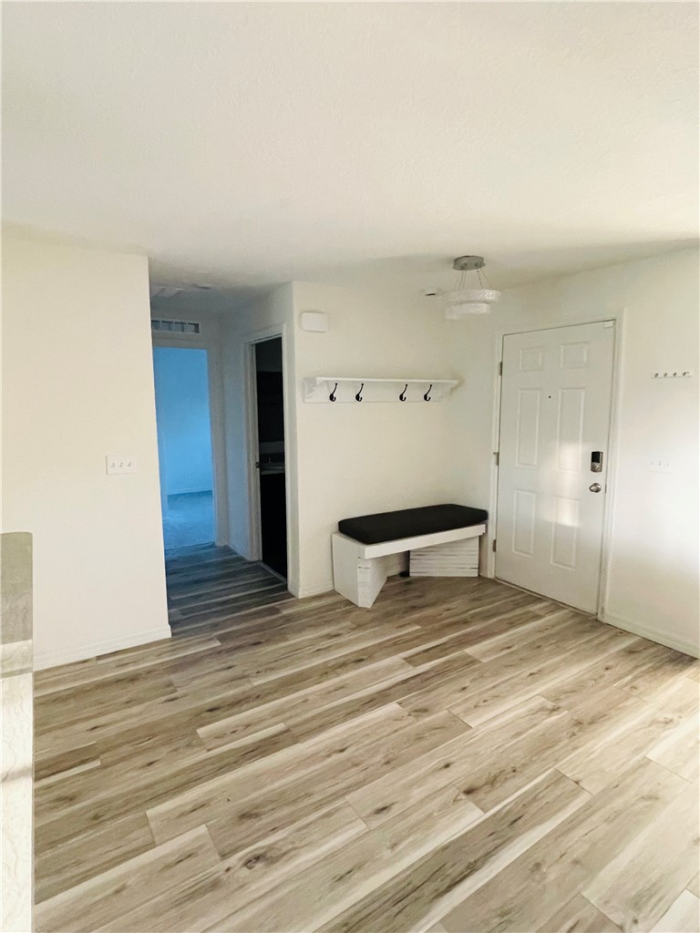 1281 Barber Street Sebastian, FL 32958 - Photo 2 of 26 a view of a room with wooden floor