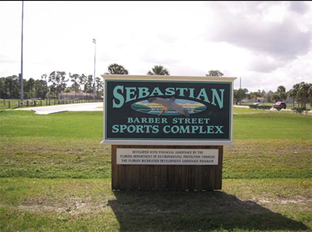 1281 Barber Street Sebastian, FL 32958 - Photo 23 of 26 a sign on the side of the river