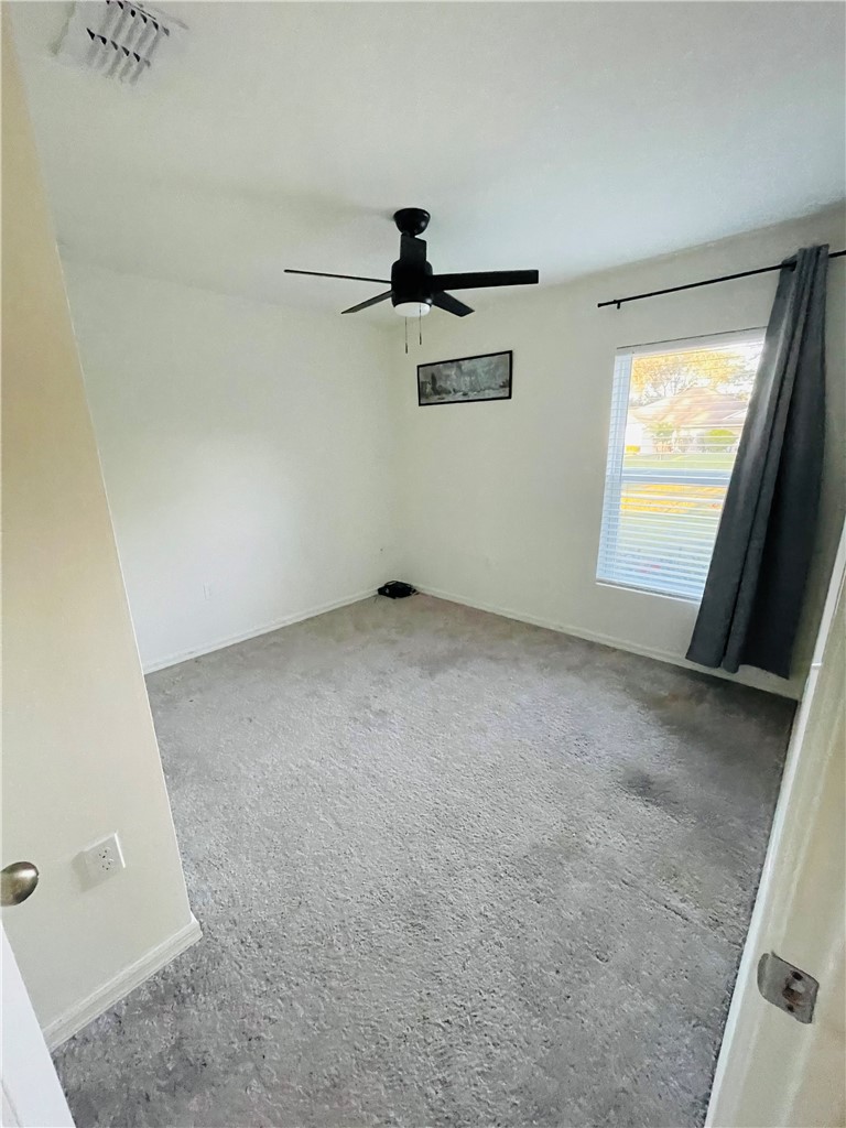 1281 Barber Street Sebastian, FL 32958 - Photo 10 of 26 an empty room with windows