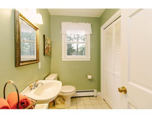 53 Fox Den Road Kingston, MA 02364 - Photo 12 of 30 a bathroom with a sink a toilet and a mirror