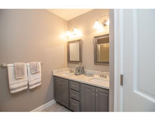 53 Fox Den Road Kingston, MA 02364 - Photo 18 of 30 a en suite bathroom with a granite countertop sink and a mirror