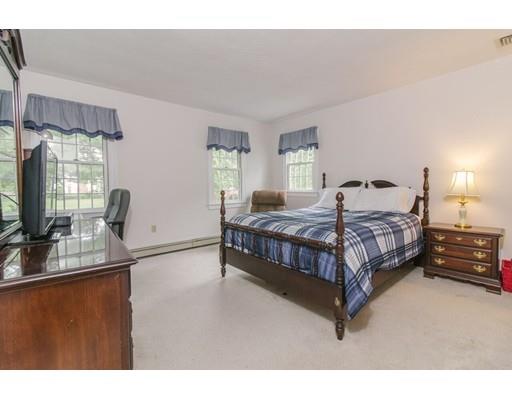 53 Fox Den Road Kingston, MA 02364 - Photo 19 of 30 a bedroom with a bed window and dresser