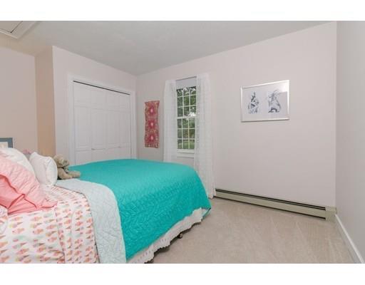53 Fox Den Road Kingston, MA 02364 - Photo 22 of 30 a bedroom with a bed and a window