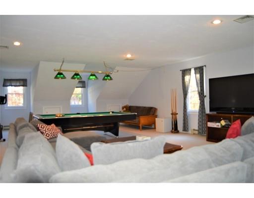 53 Fox Den Road Kingston, MA 02364 - Photo 23 of 30 a living room with furniture and a flat screen tv