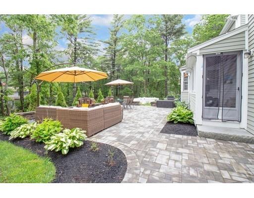 53 Fox Den Road Kingston, MA 02364 - Photo 25 of 30 a view of a backyard with a garden and plants
