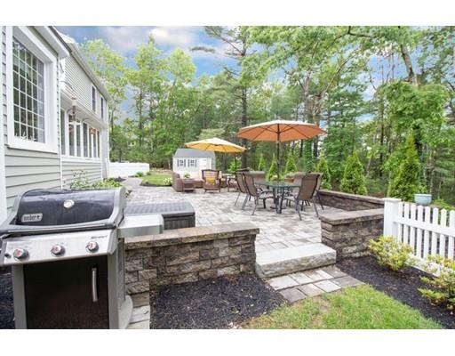53 Fox Den Road Kingston, MA 02364 - Photo 26 of 30 a view of a patio with chairs and a table