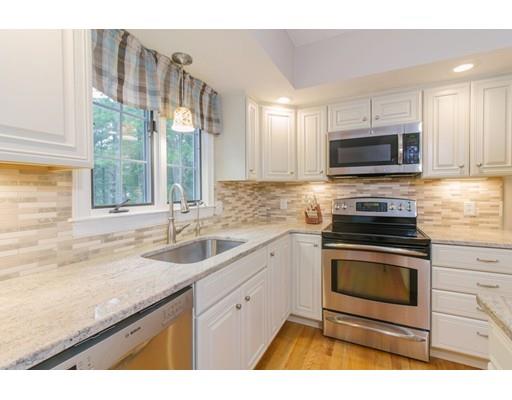 53 Fox Den Road Kingston, MA 02364 - Photo 5 of 30 a kitchen with granite countertop a sink stove and microwave