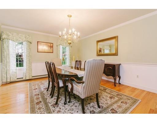 53 Fox Den Road Kingston, MA 02364 - Photo 7 of 30 a view of a dining room with furniture and wooden floor