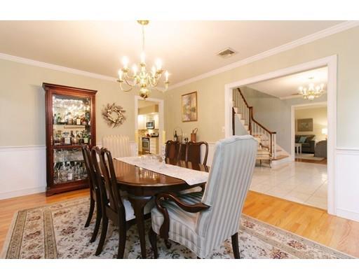 53 Fox Den Road Kingston, MA 02364 - Photo 8 of 30 a view of a dining room with furniture and wooden floor