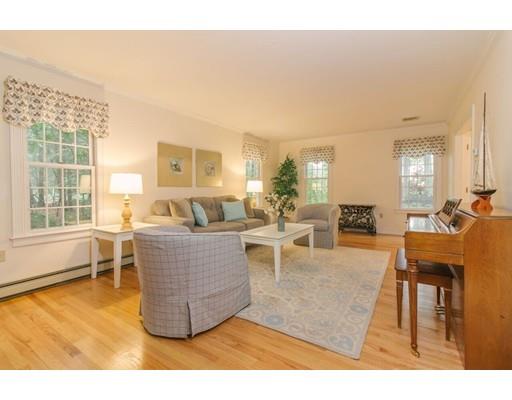 53 Fox Den Road Kingston, MA 02364 - Photo 10 of 30 a living room with furniture and a large window