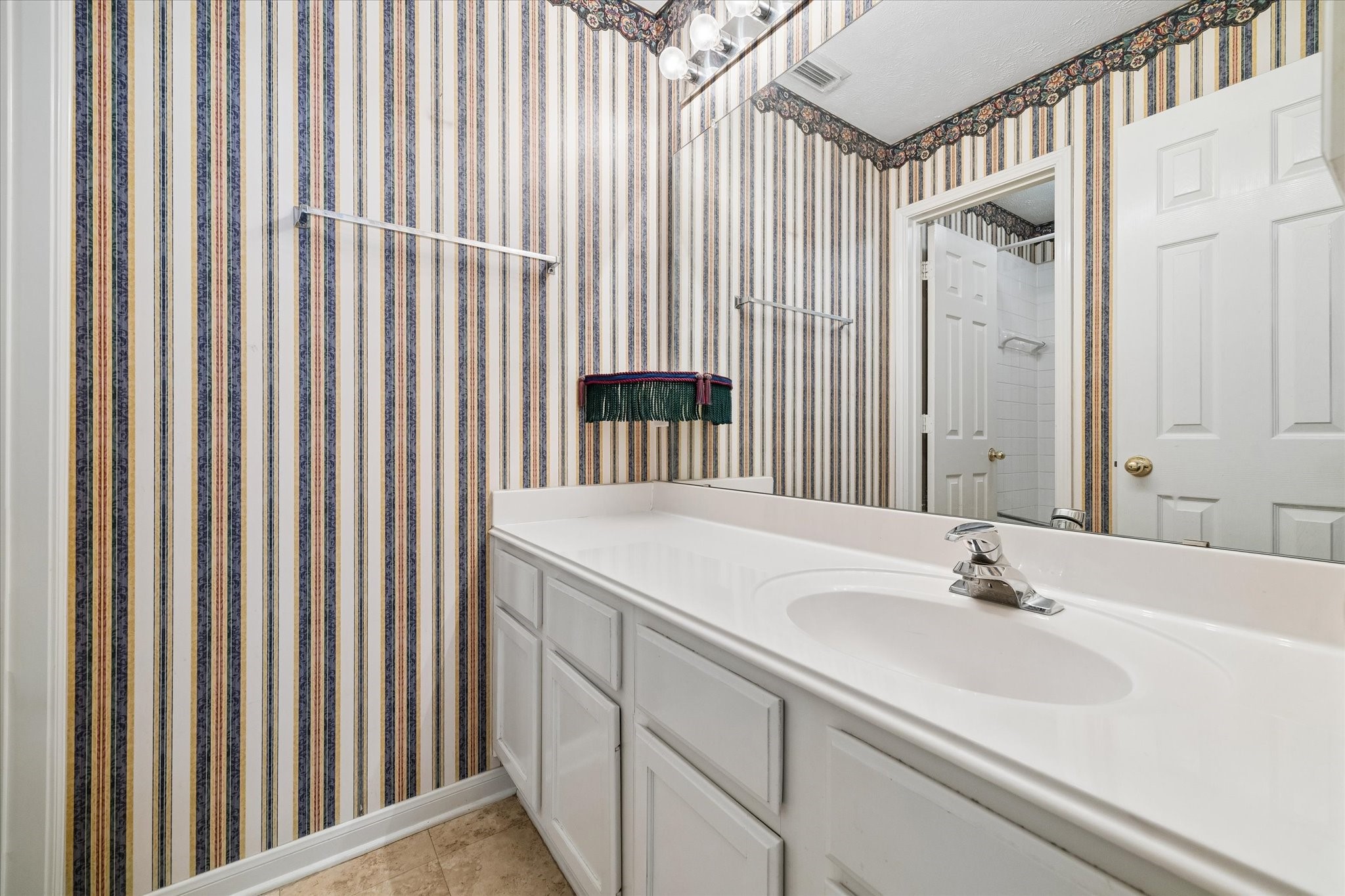 1203 Bingle Road Houston, TX 77055 - Photo 17 of 21 Full bathroom outside of secondary bedrooms 2 and 3.