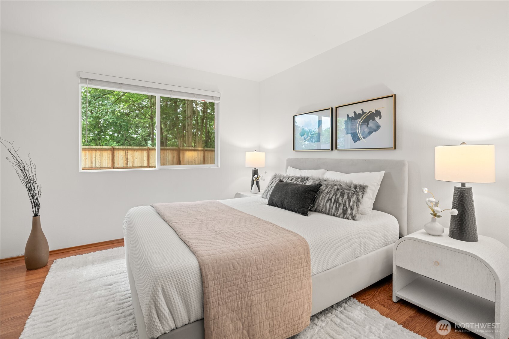 16809 Southeast 149th Street Renton, WA 98059 - Photo 18 of 30 a bedroom with bed and a window