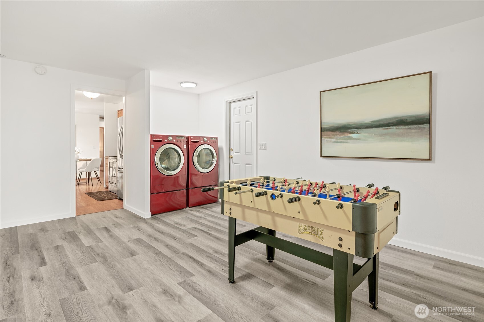 16809 Southeast 149th Street Renton, WA 98059 - Photo 22 of 30 a view of a room with furniture and wooden floor
