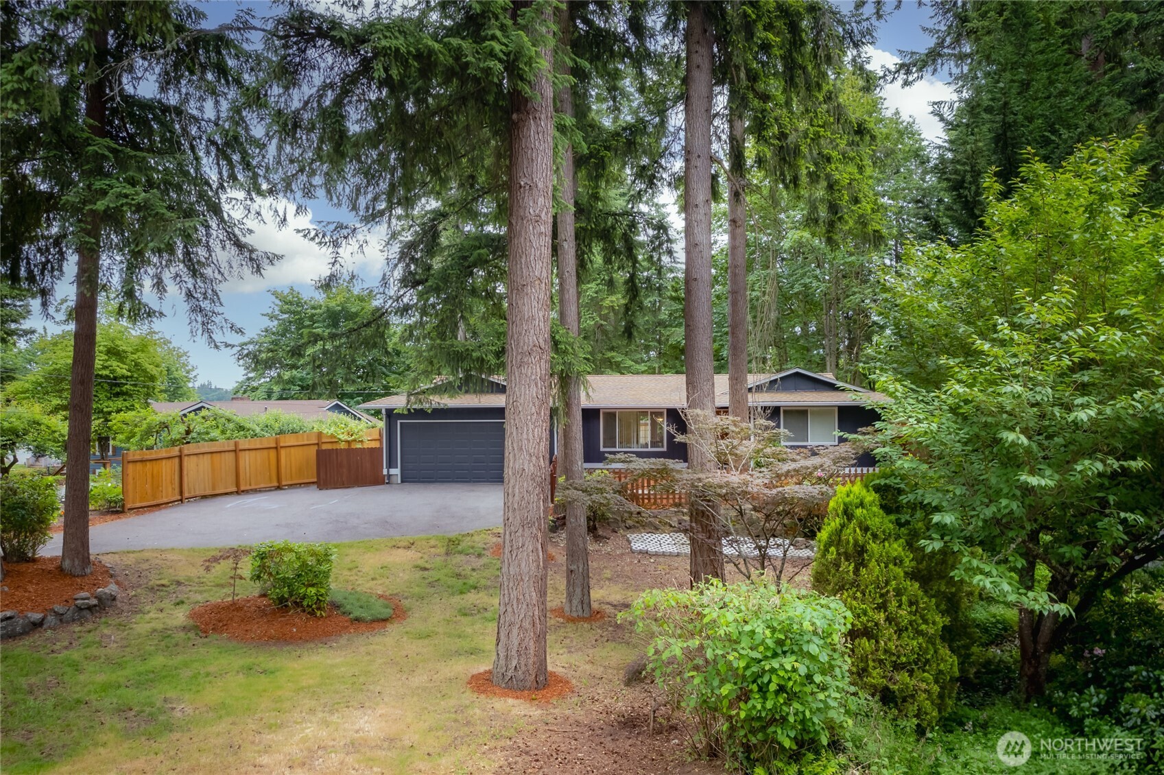 16809 Southeast 149th Street Renton, WA 98059 - Photo 24 of 30 a view of a house with backyard and sitting area