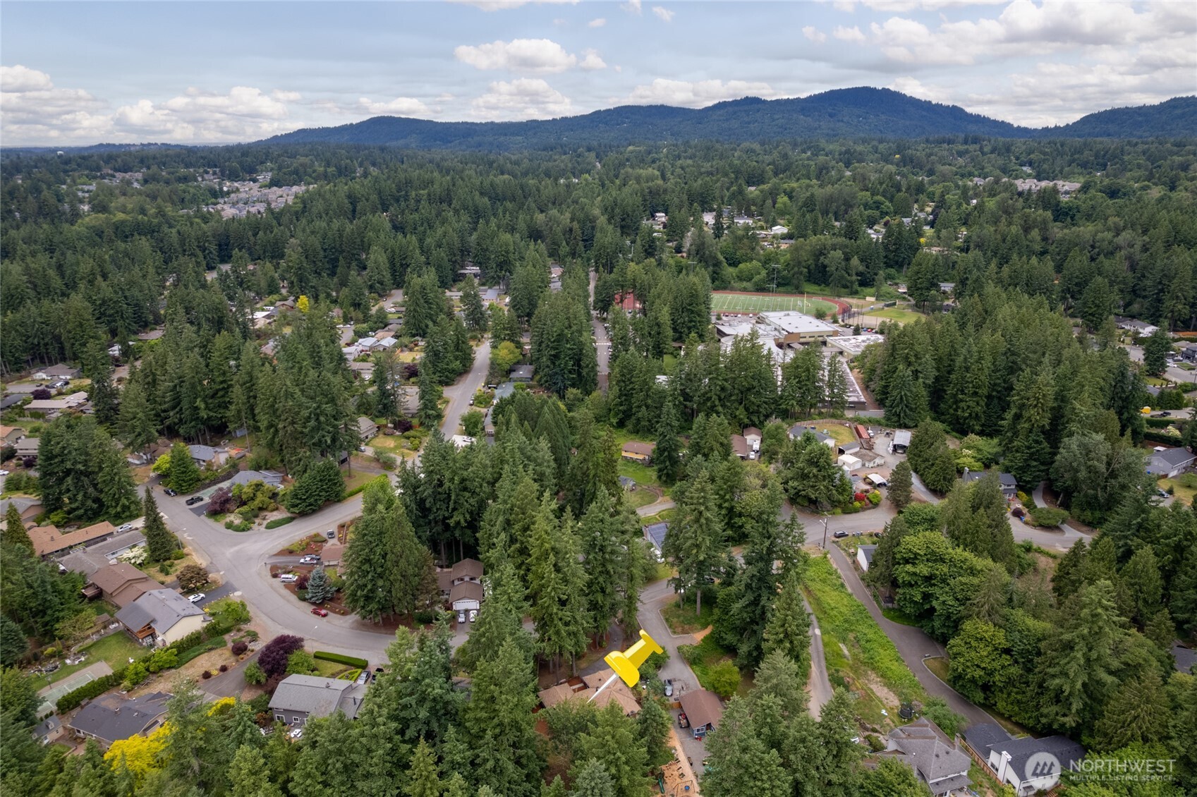 16809 Southeast 149th Street Renton, WA 98059 - Photo 28 of 30 an aerial view of residential house with green space and mountain view