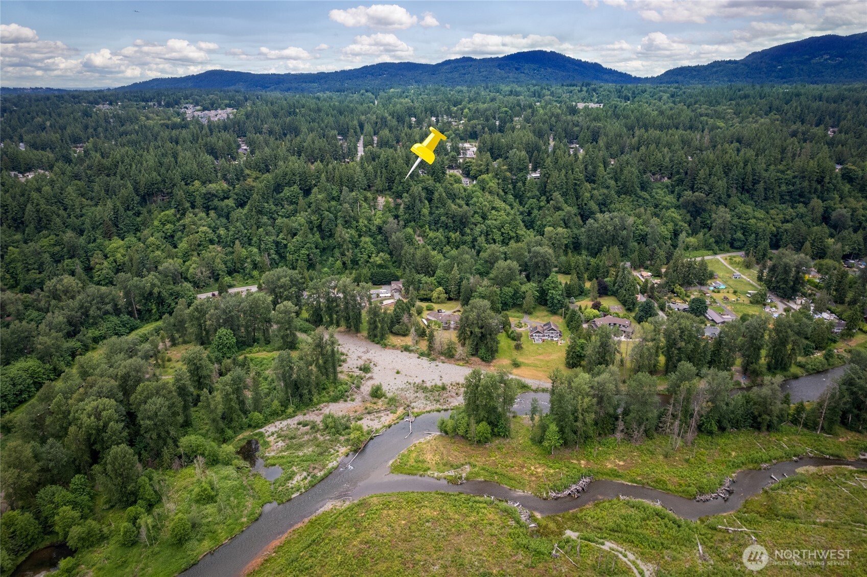 16809 Southeast 149th Street Renton, WA 98059 - Photo 29 of 30 a view of a lush green hillside and a building